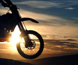 motorcycle front sunset clouds drive